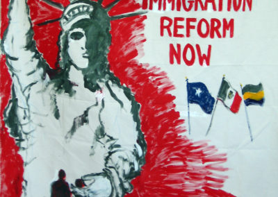 Lady Liberty with hand around a family