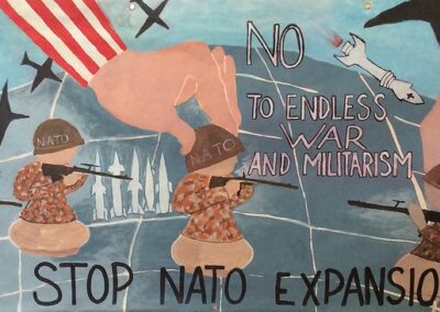 Stop Nato Expansion is shown as armed chess pieces on the globe