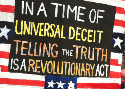 -sign-about-truth and universal deceit telling truth is revolutionary act