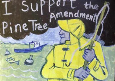 Fisherman in yellow slicker I support the Pine Tree Amendment