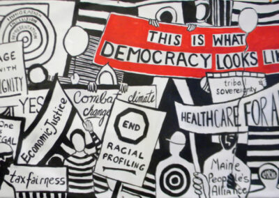 this is what democracy looks like banner over black and white images of protestors with signs