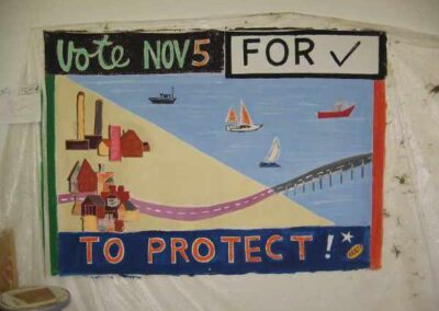 scene of maine seacoast with reminder to vote Nov 5 to protect